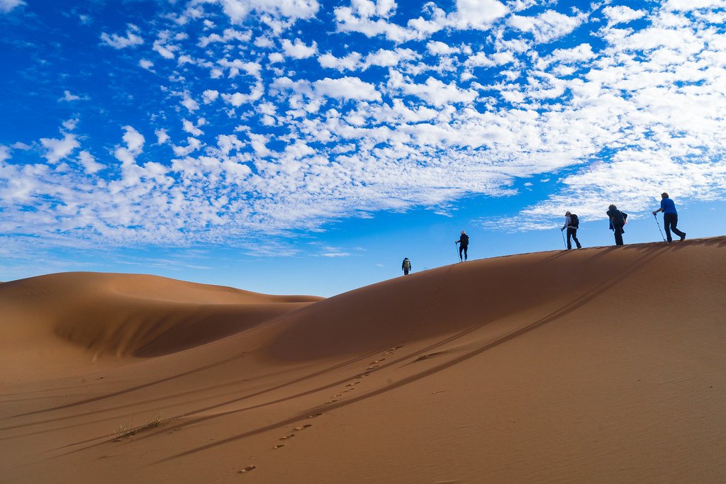 Sahara desert trekking Morocco dunes packing